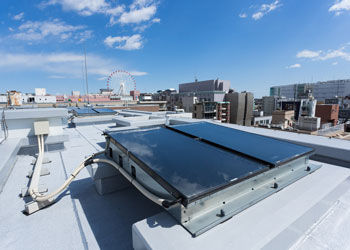 Image of the solar thermal collection unit installed on the roof