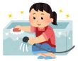 A picture of a woman cleaning the bath
