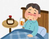 寝酒をしている男性