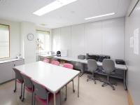 Photos of face-to-face reading room and editorial room