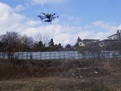 We conduct surveys using drones.