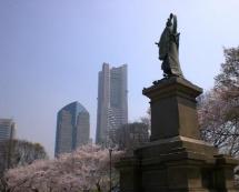 Images of cherry blossoms and bronze statues in recent years