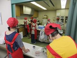 Volunteers of red apron
