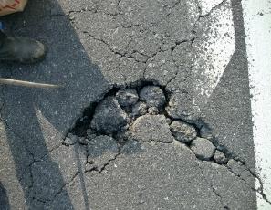Photo of the road sinking